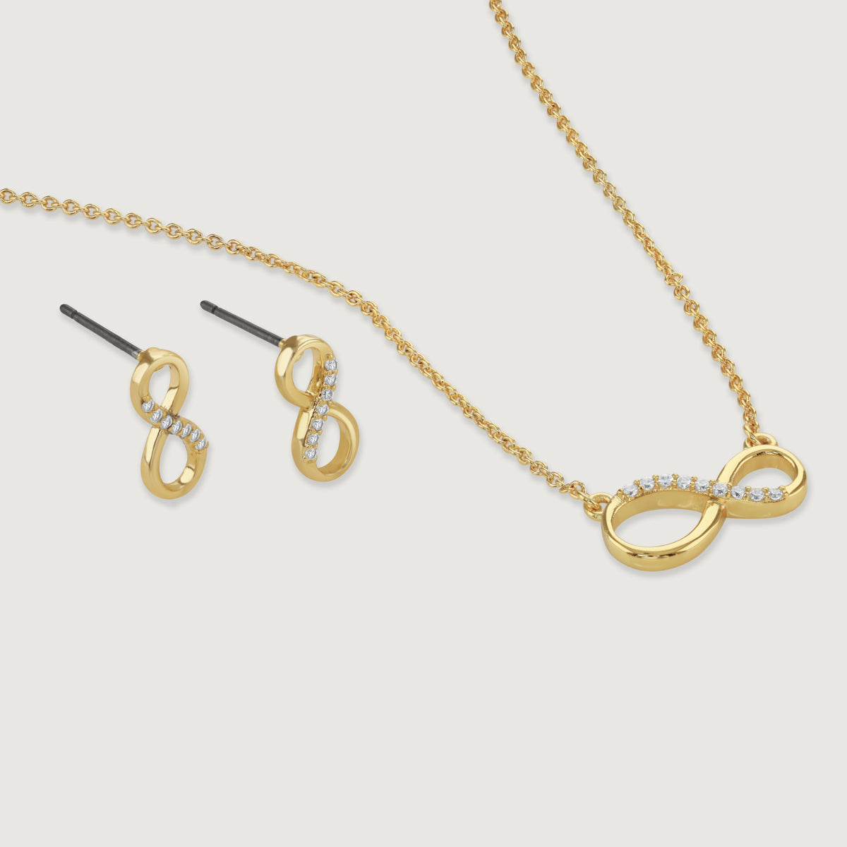 Buckley London's Infinity earring and pendant set in gold tone and crystal