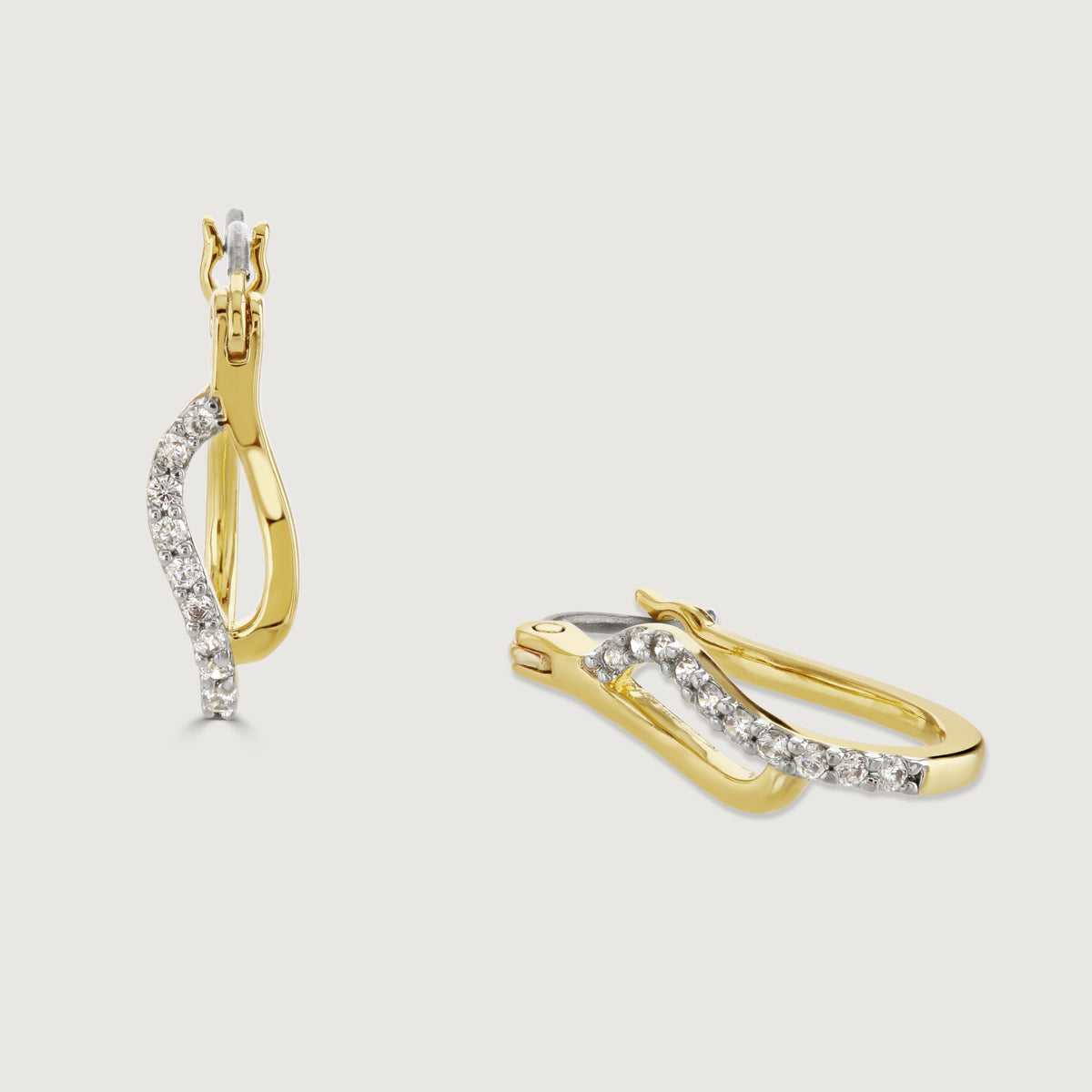 Classic pavé set and gold tone earrings by Buckley London