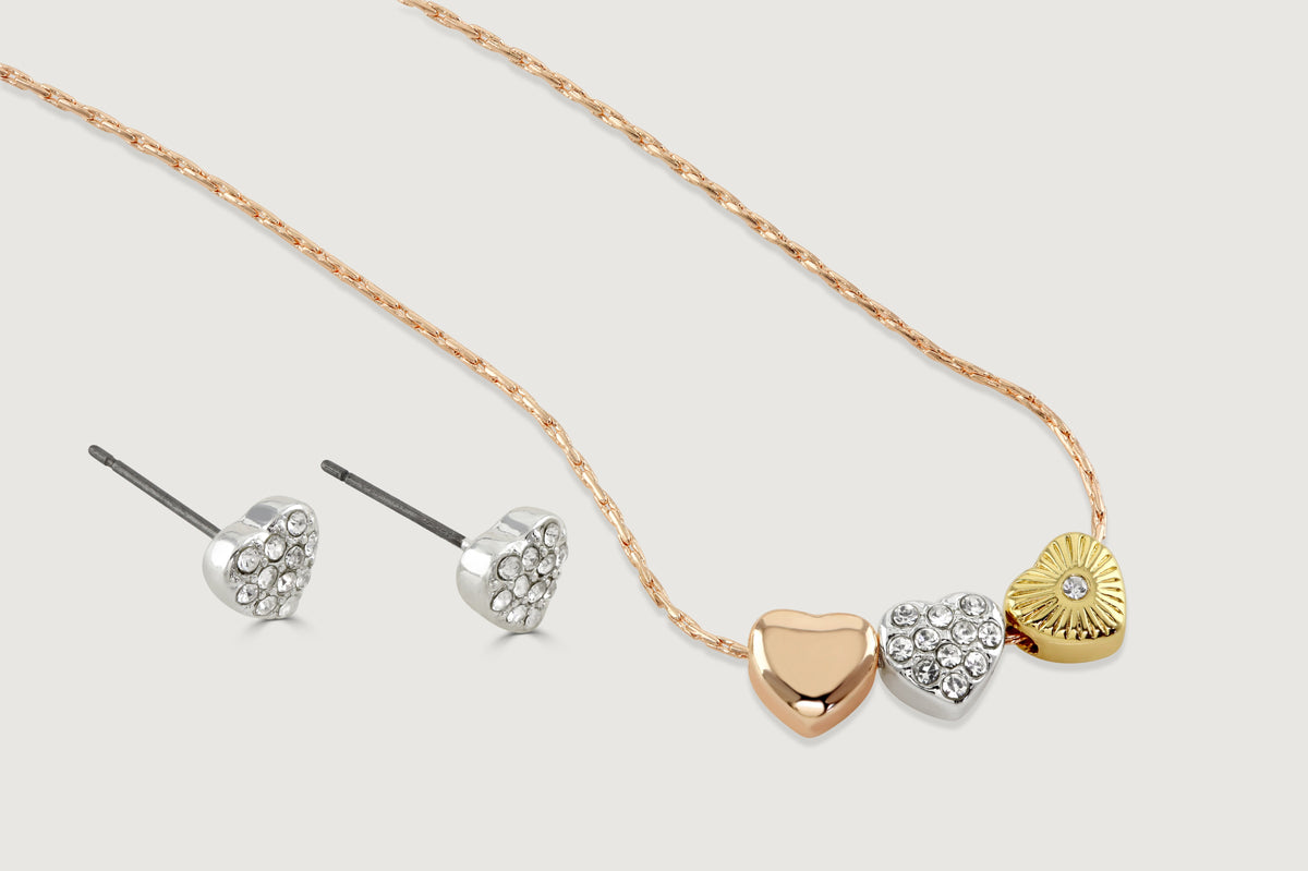 Buckley London heart trio set in gold, silver and pavé set.