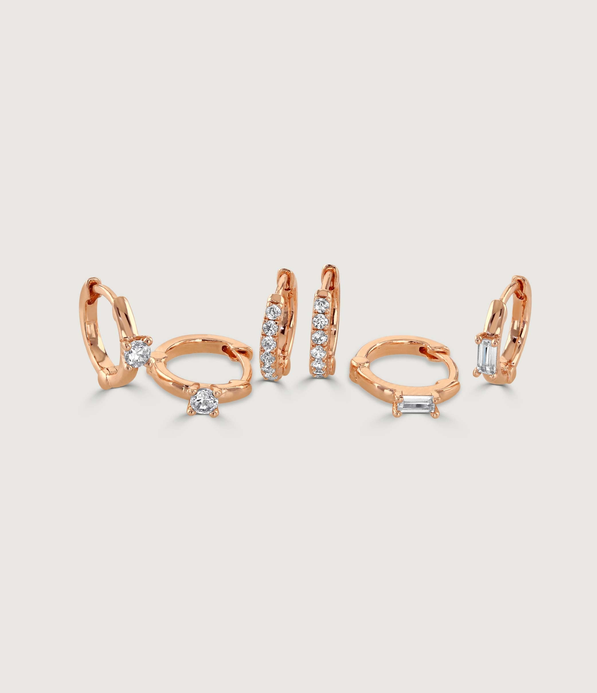 SET OF THREE GOLD AND CRYSTAL HUGGIE EARRING SET