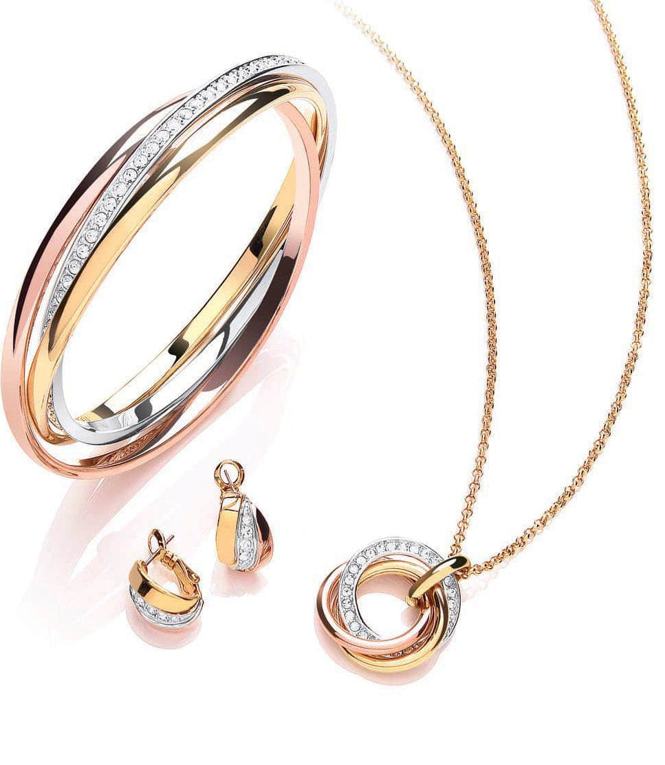 Russian trilogy gold, rose gold and rhodium plated earring set. Featuring crystal details. Comprises of a pendant, bangle and stud earrings.